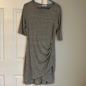 Very comfortable. Gathered on side. Asymmetrical hem.